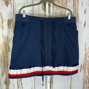 Khaki's & Co, Elegant Navy Skort with Red and White Ribbon Accents. Size 16.